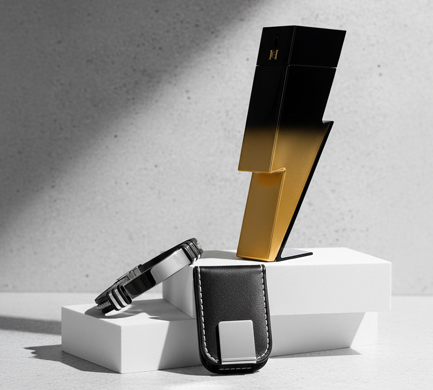 Lightning-shaped black and gold perfume bottle with a leather bracelet and black leather money clip.